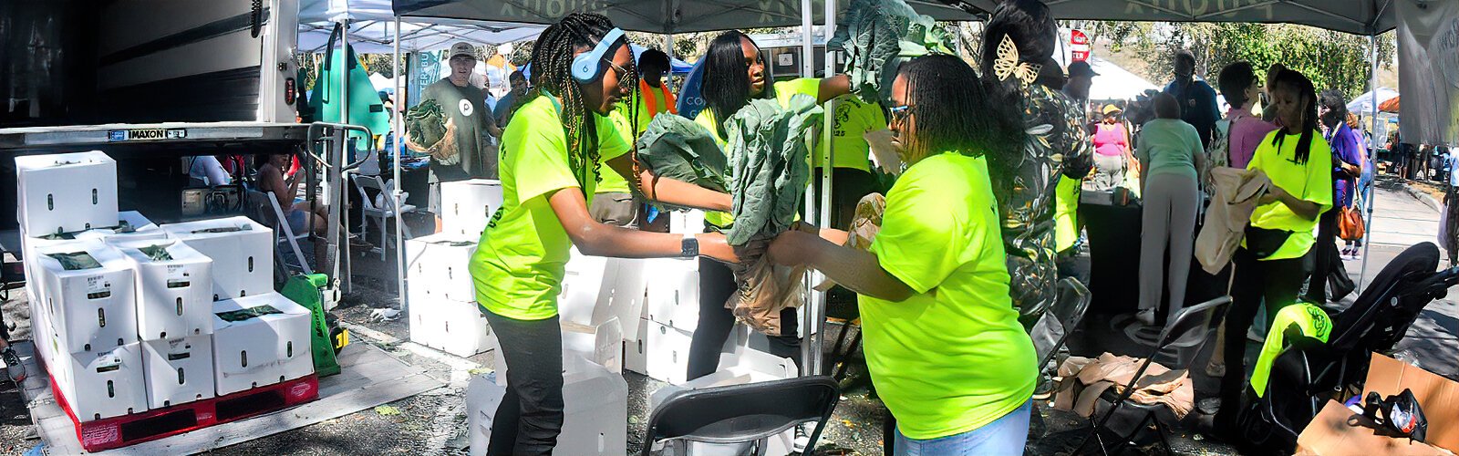 Publix volunteers unpack 3000 collard green bunches donated by Pelion, South Carolina-based WP Rawl, the premier grower, processer, and shipper of leafy greens.