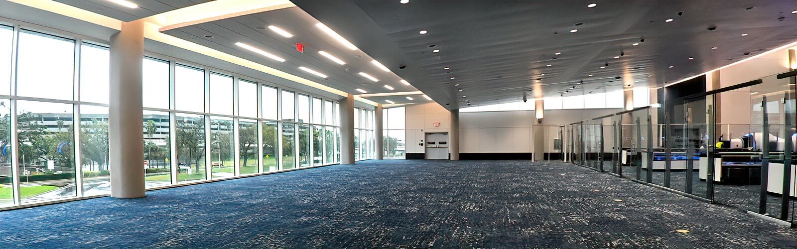 With state-of-the-art screening equipment, plenty of queueing space, and natural light, the nearly complete Airside E checkpoint will improve air travelers’ experience.